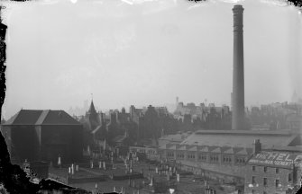 View of New Street Gasworks and Canongate Parish Church and churchyard, Edinburgh.