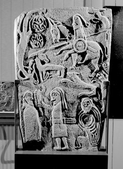 View of reverse of Inchbraoch Pictish cross slab in Montrose Museum.