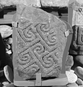 View of Drainie no. 2 cross slab fragment on display in Elgin Museum.