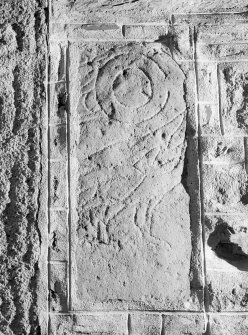 View of Fyvie no.2 Pictish symbol stone built into wall of church.