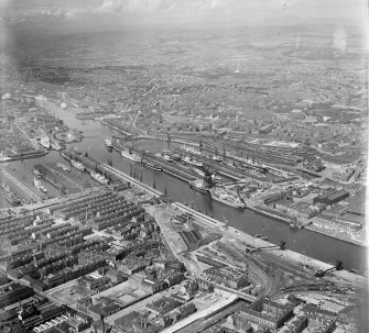 Docks from South/East Govan, Lanarkshire, Scotland. Oblique aerial photograph taken facing North/West. 