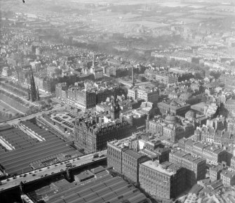 New North British Hotel and Scott Monument Edinburgh, Midlothian, Scotland. Oblique aerial photograph taken facing North/East. 