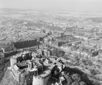 The Castle and Princes Street Station Edinburgh, Midlothian, Scotland. Oblique aerial photograph taken facing North/West. 