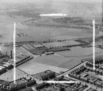 Carron Company, Mungal Foundry, Carron, near Falkirk Larbert, Stirlingshire, Scotland. Oblique aerial photograph taken facing North/West. This image was marked by AeroPictorial Ltd for photo editing.