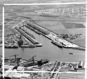 King George V Dock from North Govan, Lanarkshire, Scotland. Oblique aerial photograph taken facing South/West. This image was marked by AeroPictorial Ltd for photo editing.