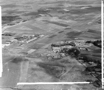 Prestwick Airport Monkton and Prestwick, Ayrshire, Scotland. Oblique aerial photograph taken facing East. This image was marked by AeroPictorial Ltd for photo editing.