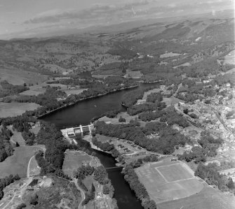 Pitlochry, Loch Tummel Hydro Electric Dam in foreground Moulin, Perthshire, Scotland. Oblique aerial photograph taken facing North/West. 