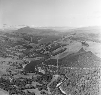 Pitlochry, looking towards Loch Tummel from North/West of town of Pitlochry Moulin, Perthshire, Scotland. Oblique aerial photograph taken facing North/West. 