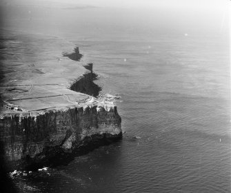 Dunnet Head and Lighthouse Dunnet, Caithness, Scotland. Oblique aerial photograph taken facing South/West. 