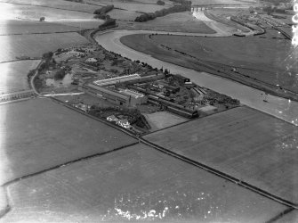 General View, Cochran and Co Annan Ltd. Newbie, Dumfries and Galloway, Scotland. Oblique aerial photograph taken facing North.