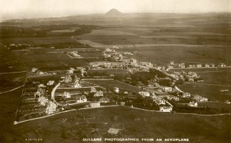 Postcard showing oblique aerial view of village.
Insc: 'Gullane Photographer from An Aeroplane'.