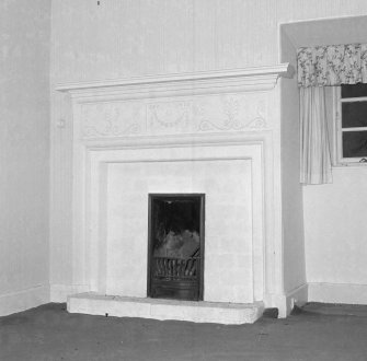 Third floor, NE wing, room above library, fireplace, detail