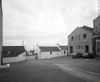 Jura Distillery
View from W across main yard of distillery, the N end of the main production block being visible (right)