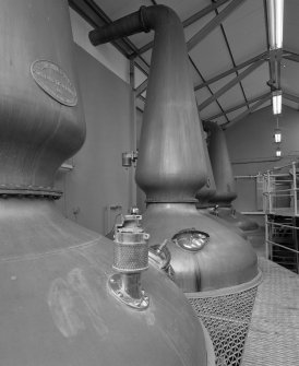 Jura Distillery
Interior view within still house showing the four steam-heated copper pot stills