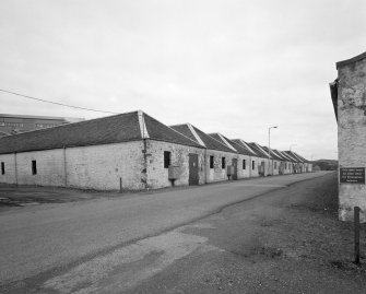 Islay, Port Ellen Distillery
View from SW showing the SW corner of the N block of bonded warehouses at the E end of the distillery