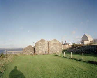 Bowmore Distillery
View from W of W gables of old warehouse block at W end of the distillery
