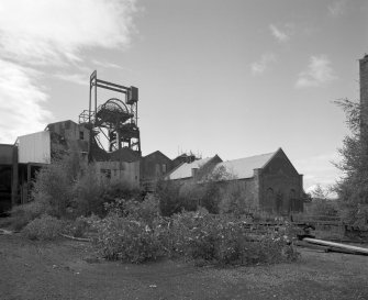 Newtongrange, Lady Victoria Colliery, Engine Houses, Pithead, and Woodroad Stores
View from NE of pithead including headframe, and Woodroad Stores