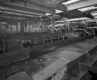 Newtongrange, Lady Victoria Colliery, Pithead Building (tub Circuit, Tippler Section, Picking Tables)
Interior view from SE at first-floor level at the S end of the pithead complex showing Picking Tables in the foreground