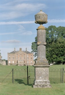 View of monument and house from South