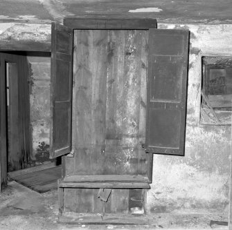 Detail of cupboard on North side of farmhouse kitchen.