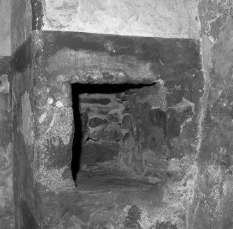 Detail of salt-box set into South side of kitchen fireplace.