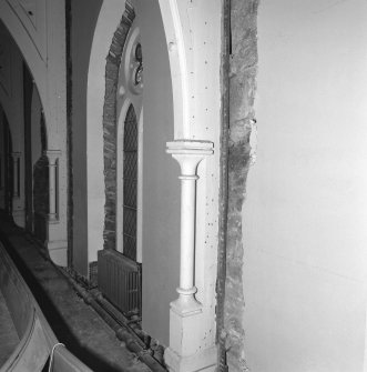 Pilaster and stained glass window, detail