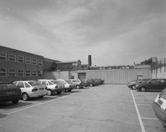 Edinburgh, Leith Walk, Shrub place, Shrubhill Tramway Workshops and Power Station
Exterior view from east showing Lothian Region Transport's offices (left), and the south east end of the workshops (centre)