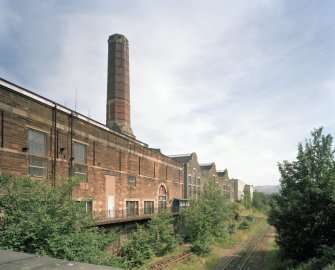 Edinburgh, Leith Walk, Shrub place, Shrubhill Tramway Workshops and Power Station
General exterior view from north west along south-west side of the works, showing the Boiler House and Chimney (left), and the gables of the Tinsmiths and Fibreglass Shops (centre distance)