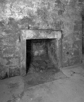 Tower, second floor, detail of fireplace