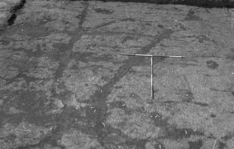 Excavation photograph : area 1 - round house slot beyond ditch 5, from E.