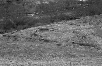 Excavation photograph : outlines of structures to S of stable block, from E.