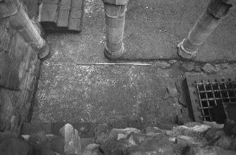 Excavation photograph : extreme NE corner of courtyard showing three easternmost columns of Italianate facade and area between them and S wall of N range excavated.