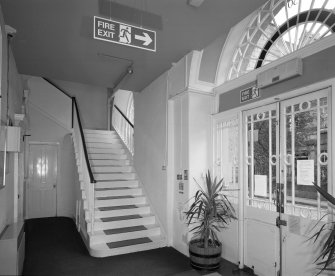 Interior. View of entrance lobby from East showing original stair to galleries