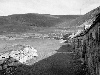 Village, Houses 12,13,14,15,16.
View from North East along street.