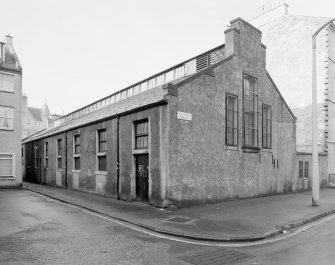 Oblique view of the rear of the former wash house seen from the South West.