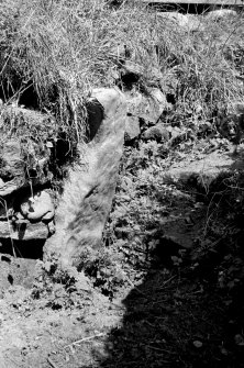 Earthhouse, 400 yds SW of Muirs of Kildrummy. North upright at door.