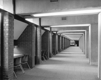 Ex-Scotland. Liverpool University, New Library. England.
Photographic view showing row of study carrels. Completion photograph.
Stamped on verso:  'John Mills 11 Hope Street Photography Limited  Liverpool L19BJ 051-709 9822'.
