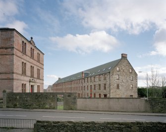 General view of  mill (right) and office (left) from W