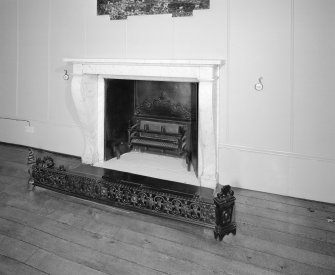 Entrance hall detail of fireplace