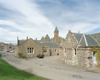 Main building. View of southern most branch from WSW