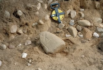 Detail of erosion to Sw side of cairn