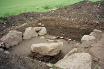 View from SE of the excavation trench. Scale in 200mm divisions