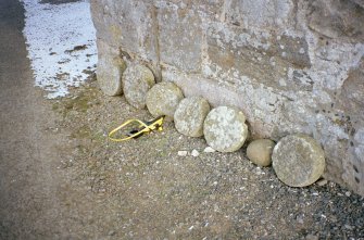 View of unprovenanced stacking stones beside church