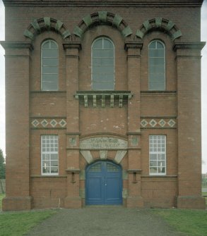 Detail showing entrance and surviving name 'Ladybank Water Works' above the door.