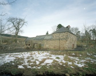 View from SW of SW side of mill, showing water wheel