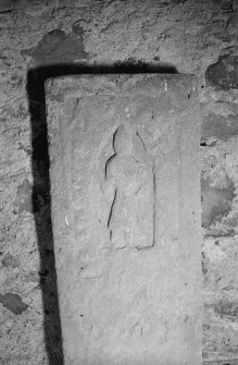 View of detail on graveslab in Lamont Aisle at Kilfinan Churchyard.