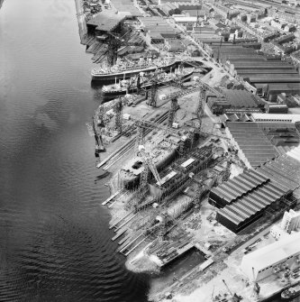 John Brown and Co, Shipyard, Clydebank, Old Kilpatrick, Dunbartonshire, Scotland, 1949. Oblique aerial photograph taken facing north.