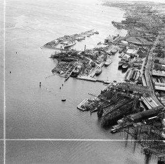 Greenock Harbour and Greenock Dockyard Co, Cartsdyke east Shipyard,   Bridgend, Greenock, Renfrewshire, Scotland, 1949. Oblique aerial photograph taken facing east.  This image has been produced from a crop marked negative.