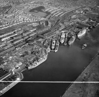 Glasgow, general view, showing Barclay, Curle and Co, Ltd, Elderslie Shipyard and Dumbarton Road, Yoker, New Kilpatrick, Dunbartonshire, Scotland, 1950. Oblique aerial photograph taken facing east.  This image has been produced from a crop marked negative.