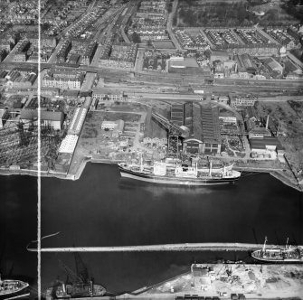 Barclay, Curle and Co, Ltd, north British Diesel Engine Works,  Whiteinch, Govan, Lanarkshire, Scotland, 1950. Oblique aerial photograph taken facing north-east.  This image has been produced from a crop marked negative.